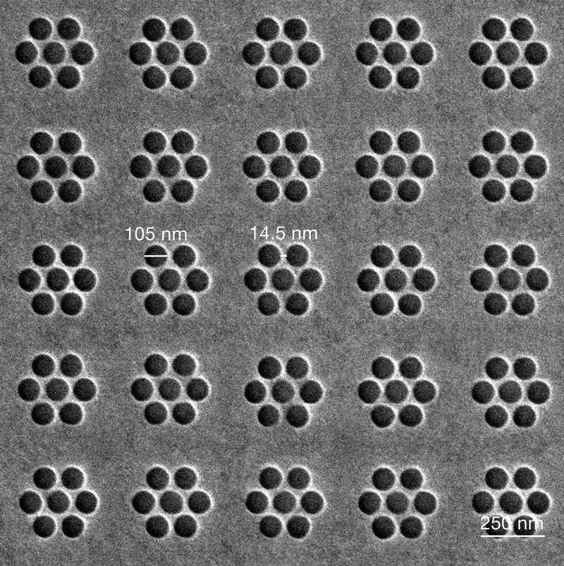 Image of an array of heptamer-arranged nanoholes generated by Lithium ion milling on a 100 nm thick gold layer